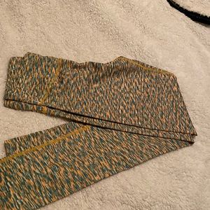 Green and yellow “Packers” leggings. Med